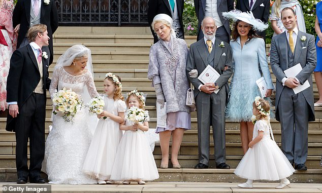 Lady Gabriella was chatting with her bridesmaid during this happy family photo