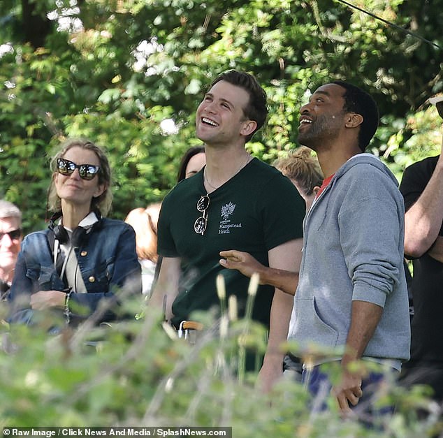 Co-star Chiwetel Ejiofor and Woodall appear to laugh at Ms. Zellweger as her character is stuck in the branches