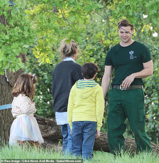 The fictional love interest was also seen talking to Bridget's two children after they rescued their mother from the tree