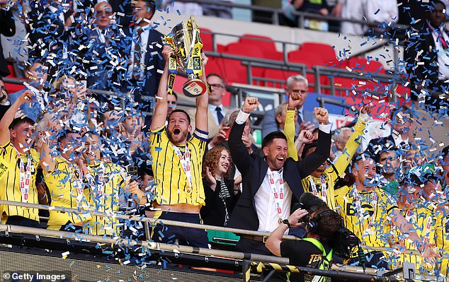 Elliott Moore lifted the trophy at Wembley after a dazzling final performance