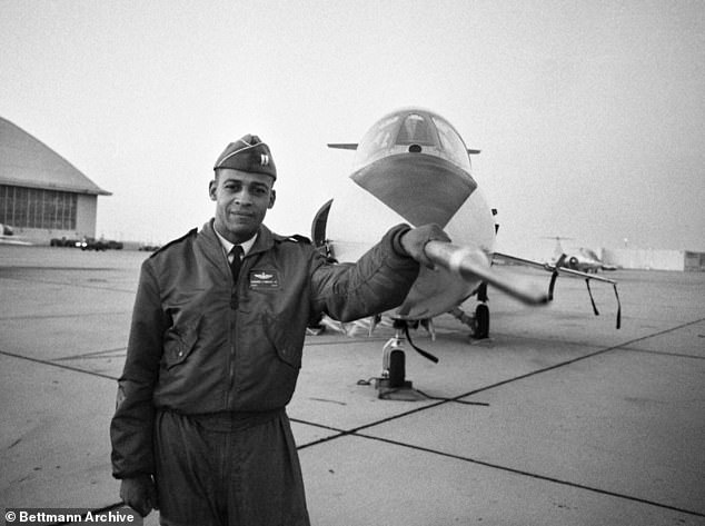 In the photo: Dwight, who rose to captain in the Air Force, stands in front of the F-104 fighter jet