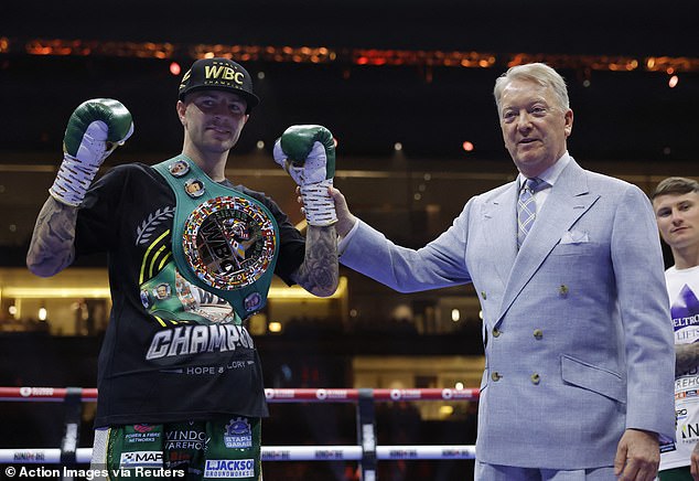 Chamberlain, pictured here with his promoter Frank Warren (right), insisted he 'wanted to keep winning' after the fight