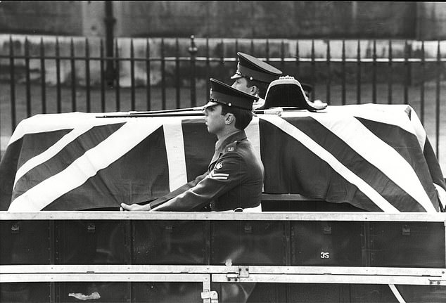 Earl Mountbatten's coffin is carried at his funeral following his death at the age of 79