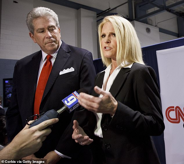 Ed Goeas and Alice Stewart speak on behalf of Michele Bachman in the spin room in 2012