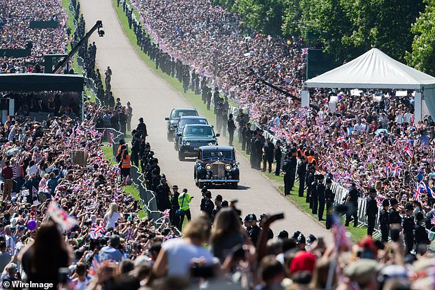 The crowds turned up in their thousands to witness this glorious day.  Above: Meghan arrives for the ceremony
