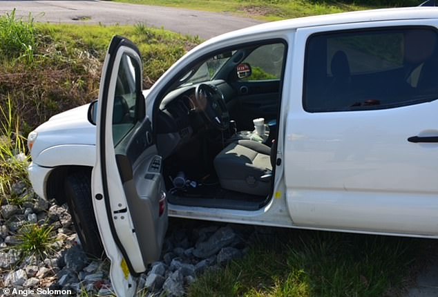 Grant's pickup is pictured in a gravel ditch.  The incident report indicated that the point of initial impact was the rear of the vehicle and that the car had functional damage