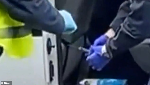 The man allegedly stabbed the police officer three times with a kitchen knife (middle of the photo), approximately 30 cm long