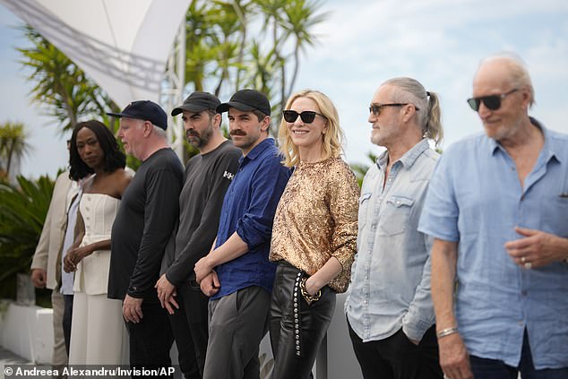 Director Guy Maddin, director Galen Johnson and director Evan Johnson pose with the stars of the film