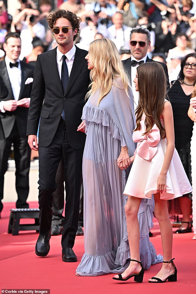 The actress, 42, put on an ethereal display in a semi-sheer dress as she arrived on the red carpet with boyfriend Oli Green, 27, and lookalike daughter Marlowe, 10