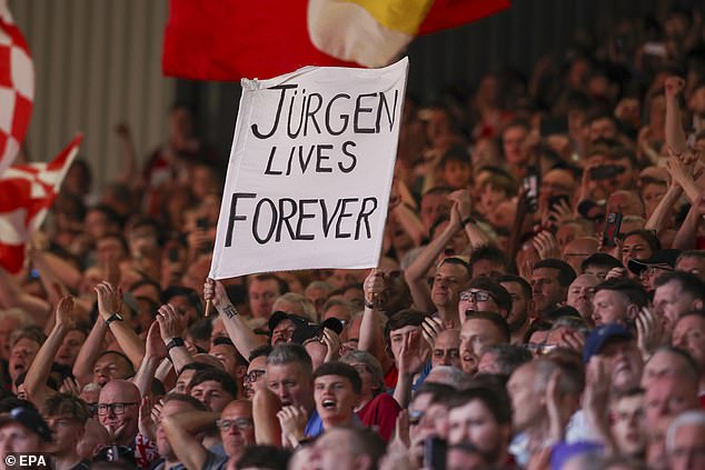 Liverpool supporters show their appreciation for Klopp as they hold up a banner reading 'Jurgen Lives Forever'