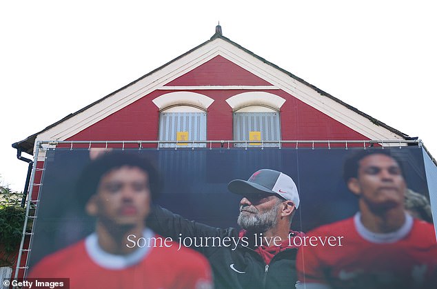 Several banners and murals have been placed above Liverpool in tribute to the persistent boss