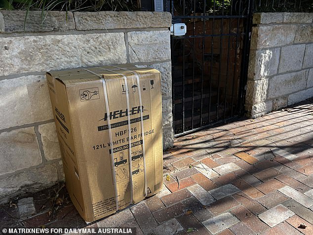 A cardboard box that appeared to contain a bar fridge was seen outside the couple's Bellevue Hill home on Sunday