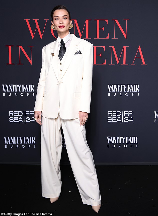 It comes after Amy stunned in a white suit and tie at the Women In Cinema Gala with the likes of Eva Longoria and Alessandra Ambrosia