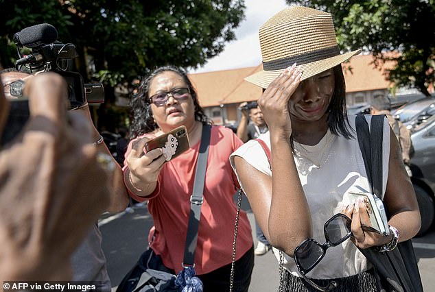 Smith was on holiday with his wife of four months, Tracy Ijusa (pictured), when police raided their room at the Champlung Mas Hotel in Legian on April 30.