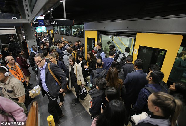 Small businesses in the city, such as cafes and dry cleaners, are also starting to thrive as workers return (photo of Sydney's peak travel time)