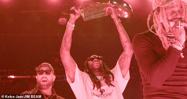 He had a lineup consisting of Lil Wayne, 2 Chainz and Diplo.  Together they brought out one of the Chiefs' Super Bowl trophies