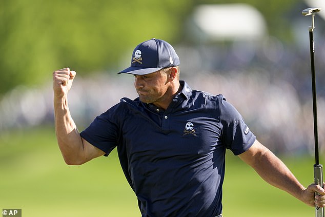 Bryson DeChambeau birdied the 18th hole to take a share of the lead at 20 under par