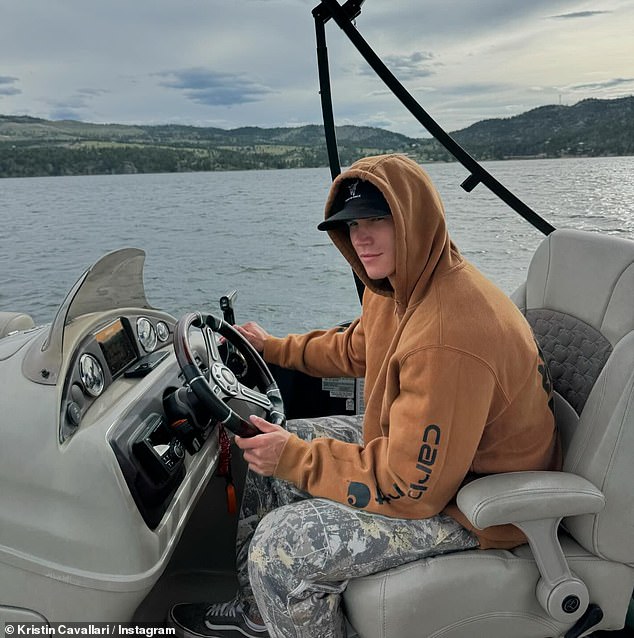 Kristin also shared photos of Mark driving the boat and lying in bed while cuddling an adorable black dog