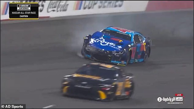 Stenhouse Jr.'s No. 47 car.  wrecked after colliding with Busch's car on the first lap