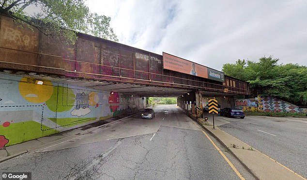 Robert Christie lives near a low-clearance bridge, where trucks make a U-turn and suddenly reverse into his house