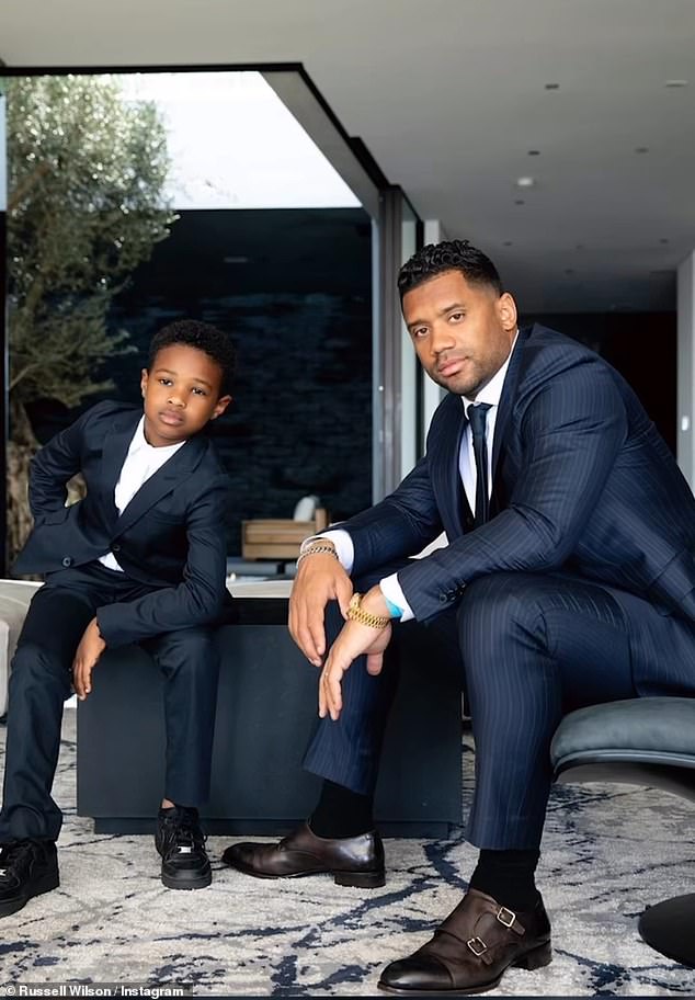 The pair even posed side by side in matching black suits for a public outing