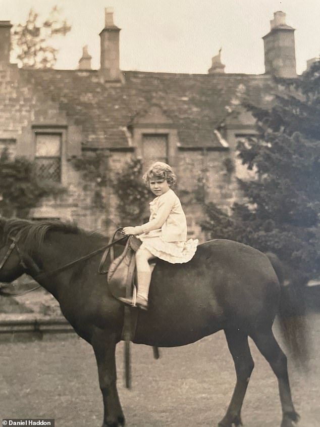 Young Princess Elizabeth pictured in the floral dress as she spends a summer at Glamis Castle