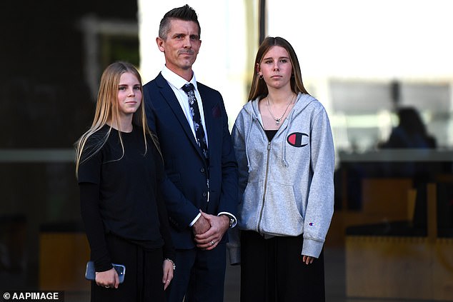 Lee Lovell and his daughters Kassie (left) and Scarlett (right) are pictured outside court