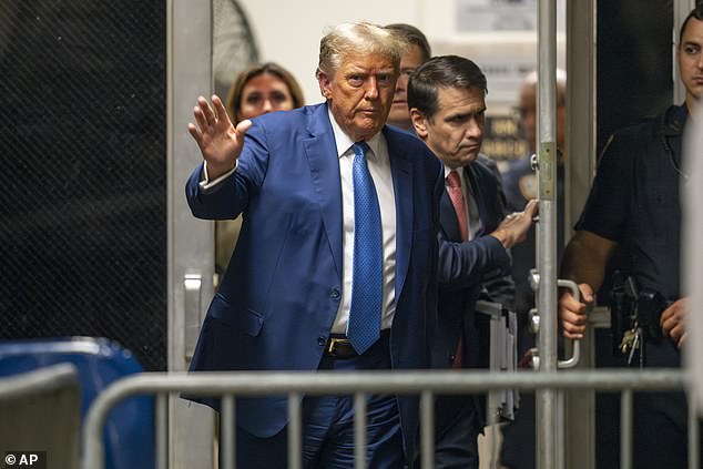 Former President Donald Trump returns from lunch to his trial in Manhattan Criminal Court