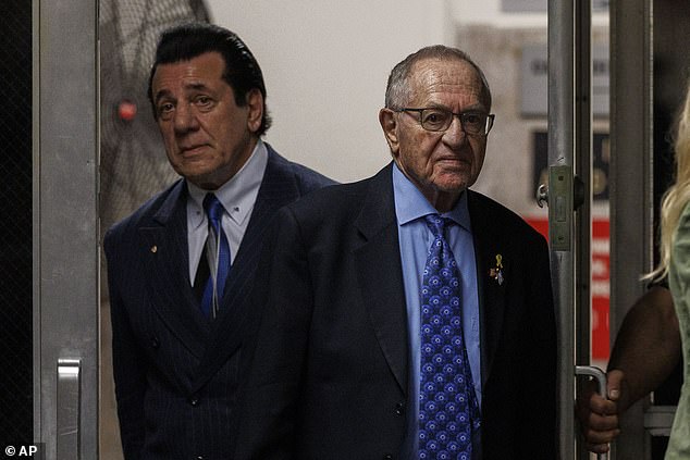 American actor Chuck Zito (left) and lawyer Alan Dershowitz return from lunch to the trial of former President Donald Trump at Manhattan Criminal Court, Monday, May 20, 2024