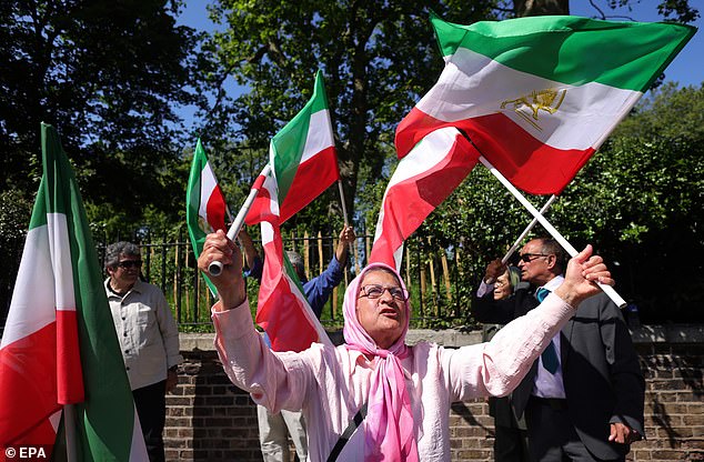 Protesters celebrated Raisi's death in London on Monday