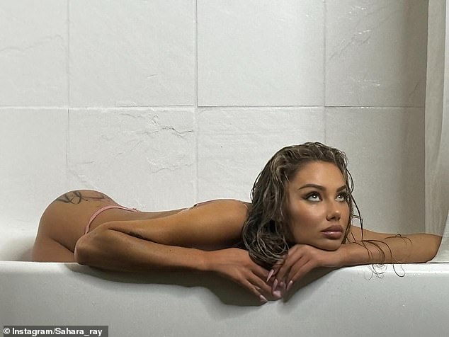 Sahara left little to the imagination, wearing a see-through bra and thong as she stretched her body in the bath