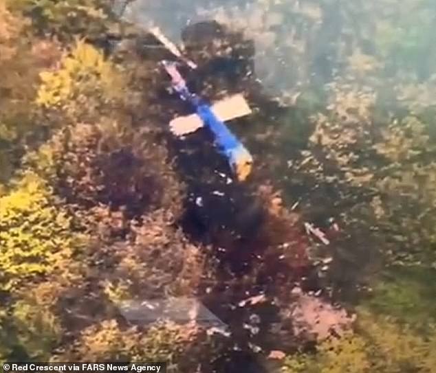 Iranian President Ebrahim Raisi has been declared dead after rescuers found a helicopter carrying him and other officials that crashed in Iran's mountainous northwest.  This still image shows drone footage of the crash site