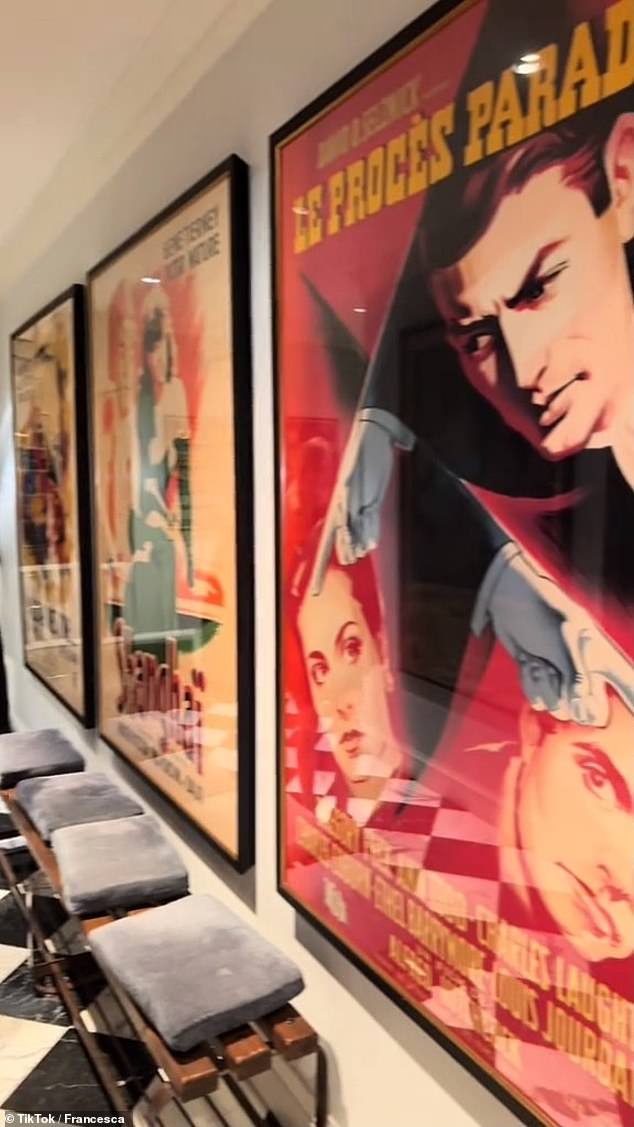 Some of the many posters hanging in the hallway of the Scorsese home can be seen here