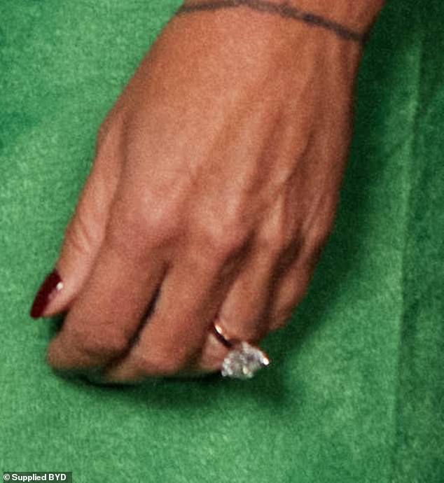 However, it was the beautiful diamond sparkler worn on her ring finger that attracted the most attention, sparking rumors that she and Kelly were soon engaged.