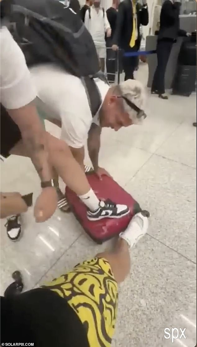 He was told that he would have to pay an extra €70 to take the damaged suitcase on board