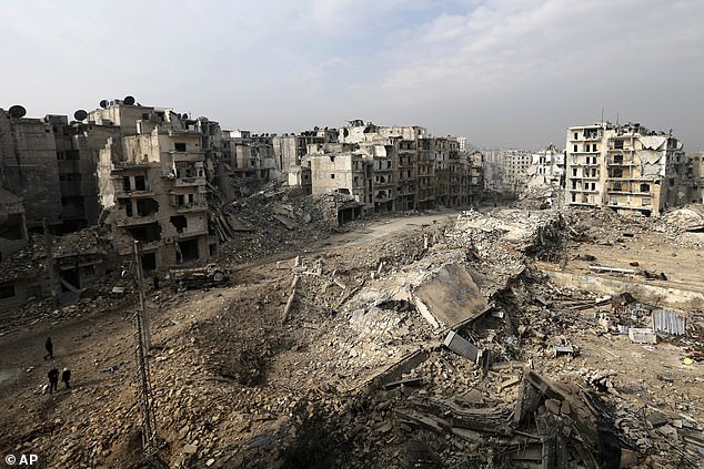 Syria's civil war, which has killed nearly half a million people and displaced half of its pre-war population of 23 million, began in March 2011 as peaceful protests against Assad's government.  The protests were met with brutal crackdowns and the uprising soon turned into a full-blown civil war.  In the photo: a neighborhood in Aleppo is reduced to rubble in 2017 (archive photo)