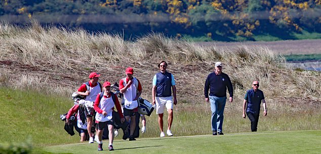 The royal family was accompanied by a large group of golfers and caddies, but was far removed from the royal action today