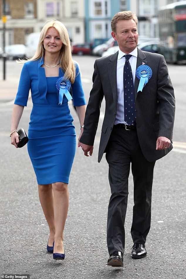 Craig Mackinlay and his wife Kati arrive at the Thanet South constituency counting center on May 8, 2015 before he was elected local MP