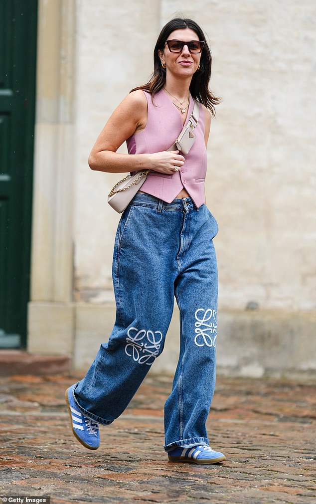 Influencer Francesca Saffari wore blue Adidas Gazellen with Loewe jeans at Copenhagen Fashion Week in August 2023