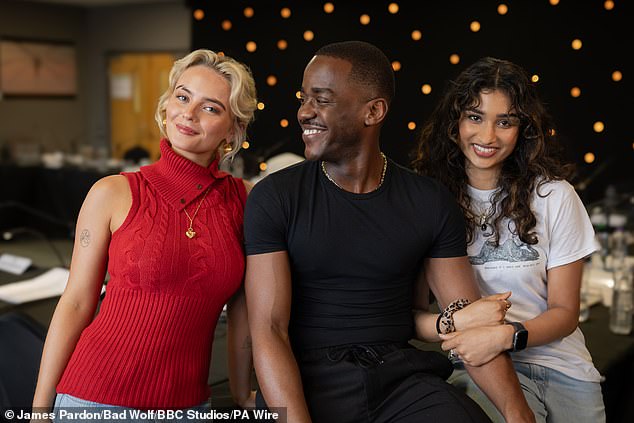 Millie will be joined on the show by a new companion, Varada Sethu (PHOTO: Millie, left, Ncuti, center, and Varada, right, seen at the announcement of Varada's new role in April)