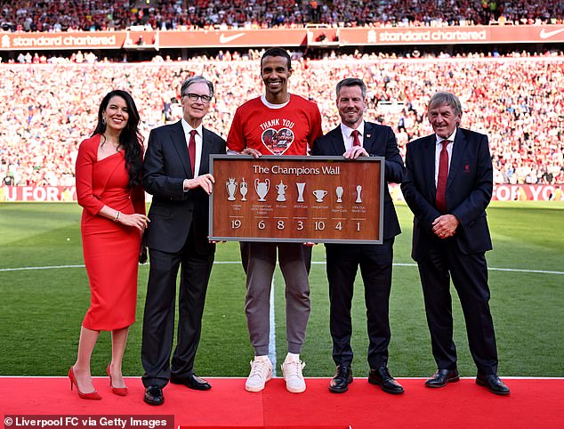 Joel Matip received - together with Thiago and Klopp and his staff - a memorial plaque