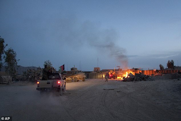 A waste incinerator pit at Forward Operating Base Caferetta Nawzad, Helmand Province south of Kabul, Afghanistan in 2011