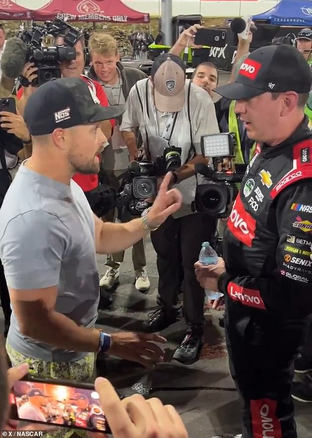 Stenhouse Jr.  (left) waited for Busch (right) after Sunday's race and unleashed a right hook