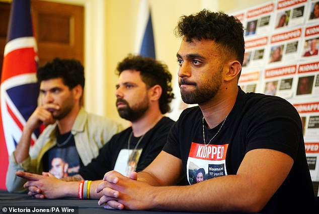 Naama Levy's eldest brother, Amit Levy (pictured right), 21, who is now advocating for the hostages, tells the Mailonline that the video made him feel stronger emotions than feeling sick