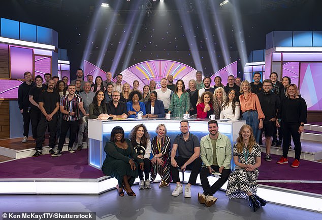 At the end of the episode, the cast and film crew all posed together as Angela posed with the group in her green dress.