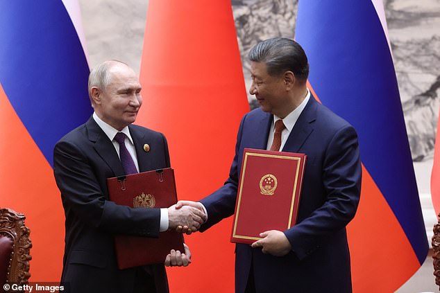 President Xi Jinping and President Vladimir Putin showed a show of unity in Beijing yesterday, but there seemed little chance that Number 10's request would be accepted.  The pair greeted each other warmly to discuss plans to boost their anti-West alliance