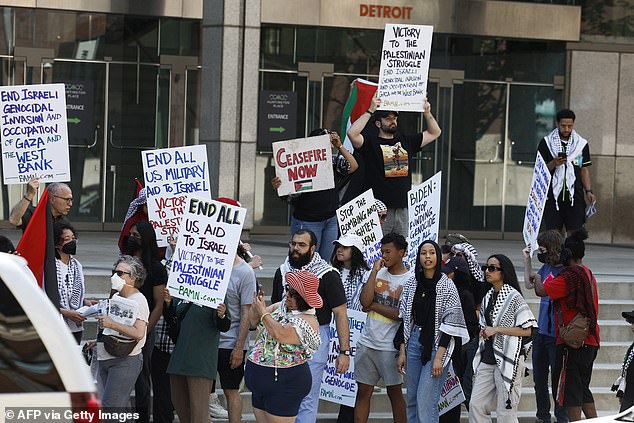 Pro-Palestinian demonstrators protest as President Joe Biden attends the NAACP Freedom Fund dinner in Detroit, Michigan this weekend