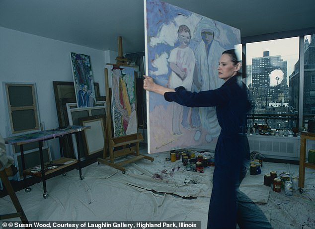Artist Gloria Vanderbilt was seen holding one of her beautiful paintings in 1976