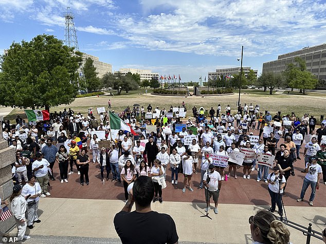 Oklahoma City immigration attorney Sam Wargin Grimaldo speaks to a group outside the Oklahoma Capitol on Tuesday, April 23.  Protesters gathered to show their opposition a bill that would impose criminal penalties for staying in the state illegally.