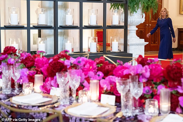 About 1,000 candles will line the walls;  American roses, together with fuchsia and purple African orchids, will form the showpieces